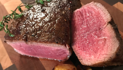 Cooked cut of beef ready for eating